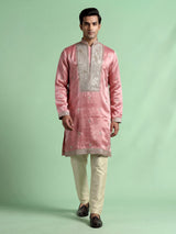 Pastel pink Dupion silk kurta suit with heavy zardozi embellishments for mens