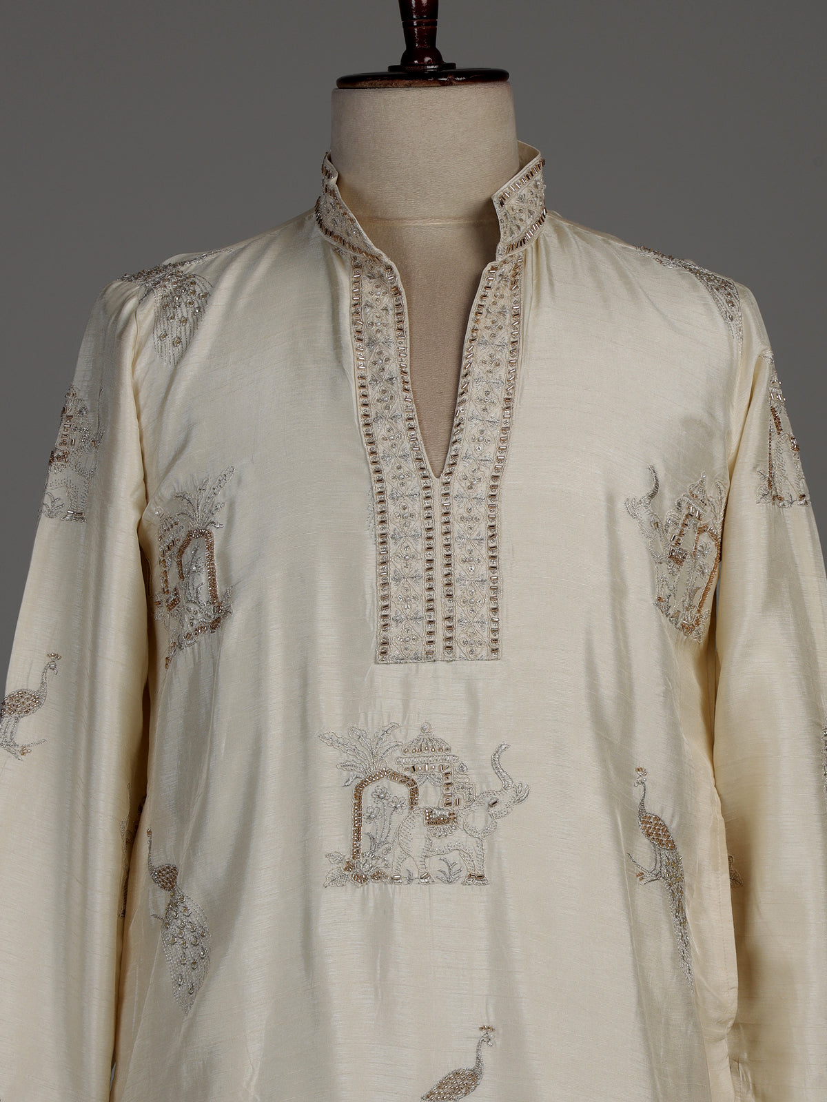 Cream raw silk kurta suit with royal peacock and elephant embroidery for mens