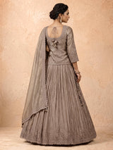 Pastel grey tissue silk lehenga choli with stone and zardosi work