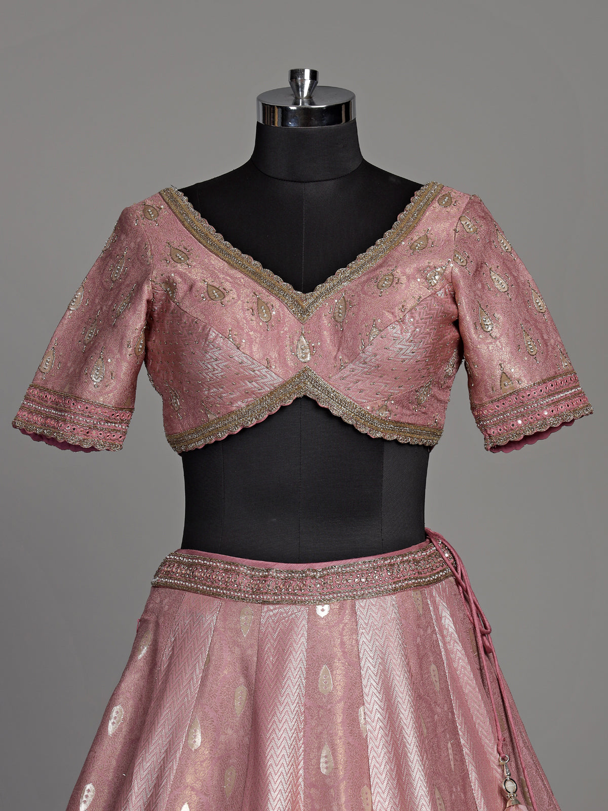 Pink banarasi silk lehenga choli with luxurious zari and pearl embellishments