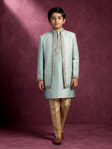 Pastel mint green silk boys Indo-Western suit with ornate floral embellishments