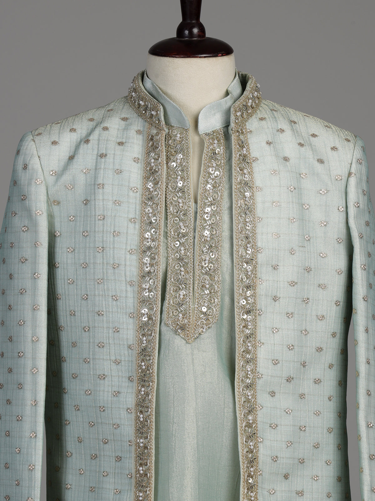 Pastel mint green silk boys Indo-Western suit with ornate floral embellishments