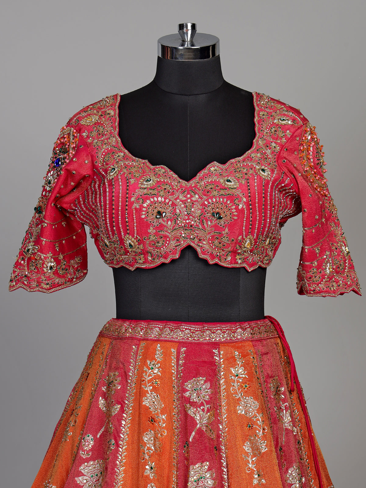 Multicolour silk lehenga choli with floral motifs and embellishments