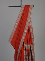 Elegant rust red silk saree with embroidered pallu and sequins