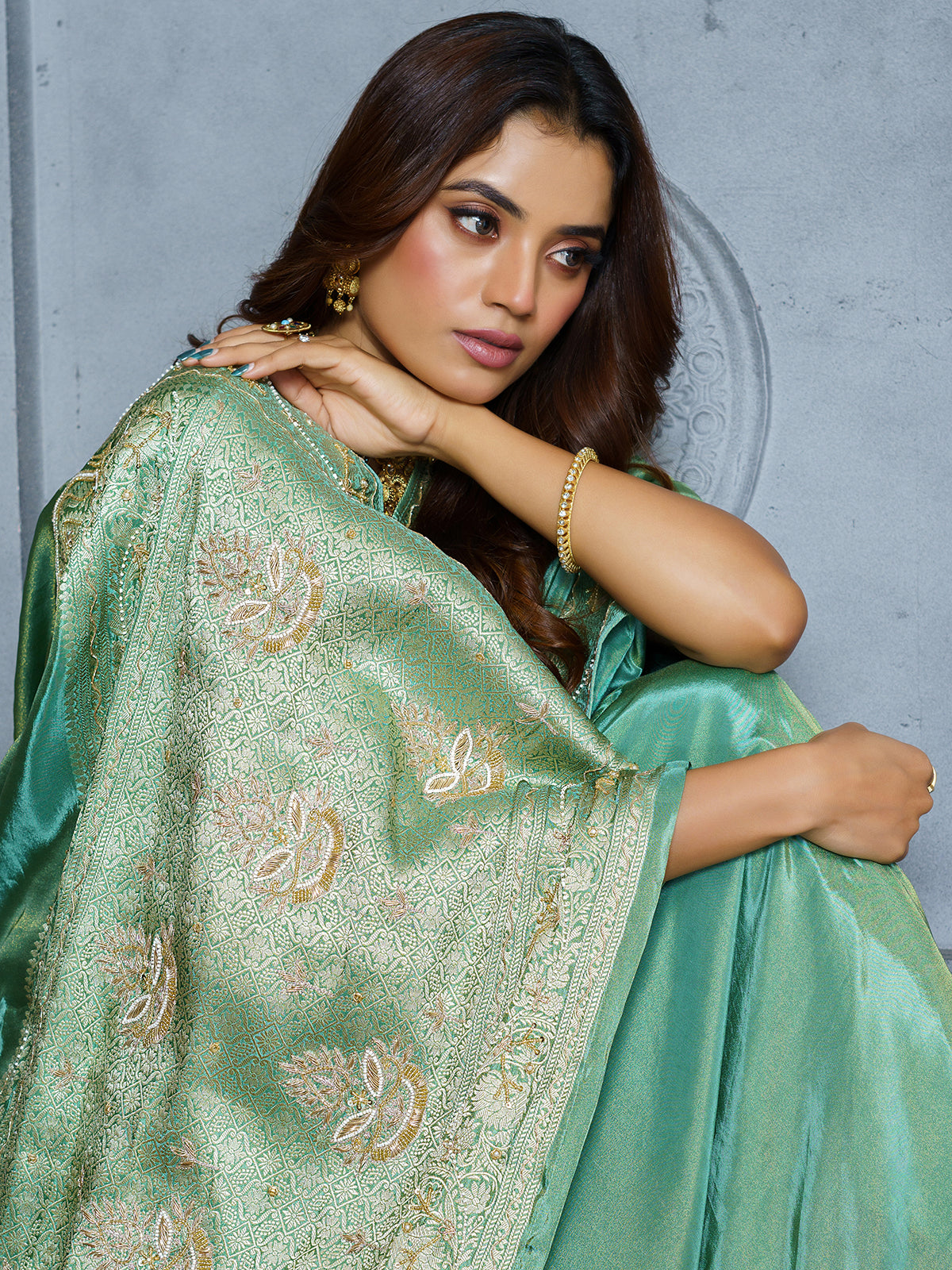Luxury pastel green embroidered tissue saree for women