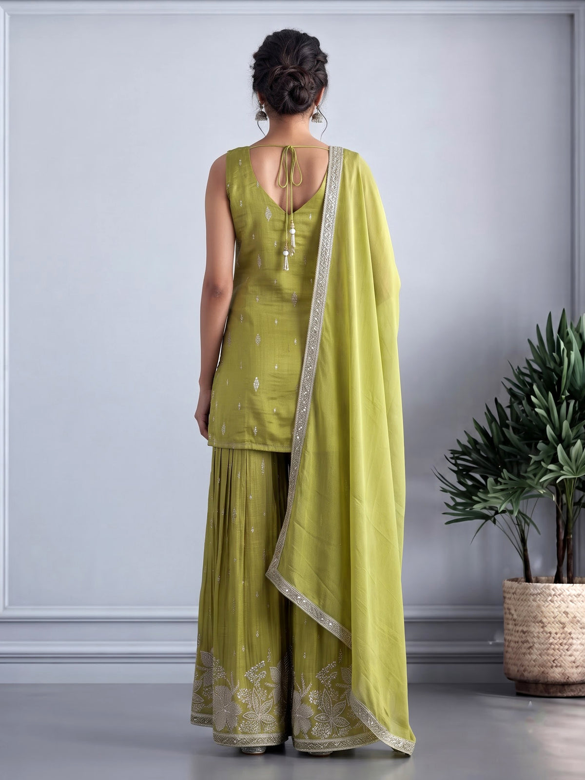 Pastel mehendi green silk palazzo suit with pearl embellishments