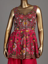 Rani pink silk palazzo suit with mirror work and net dupatta