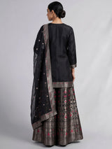 Black banarasi silk palazzo suit with an ornate zari yoke