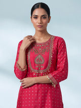Rani pink silk bandhani suit with an embellished yoke