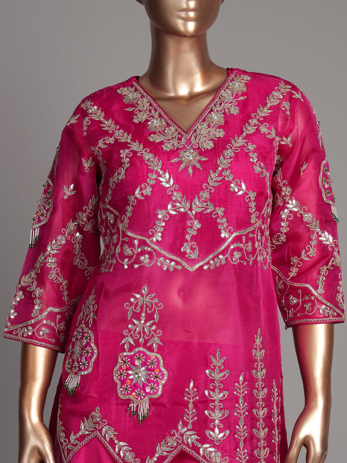 Rani pink chanderi silk palazzo suit with gota detailing