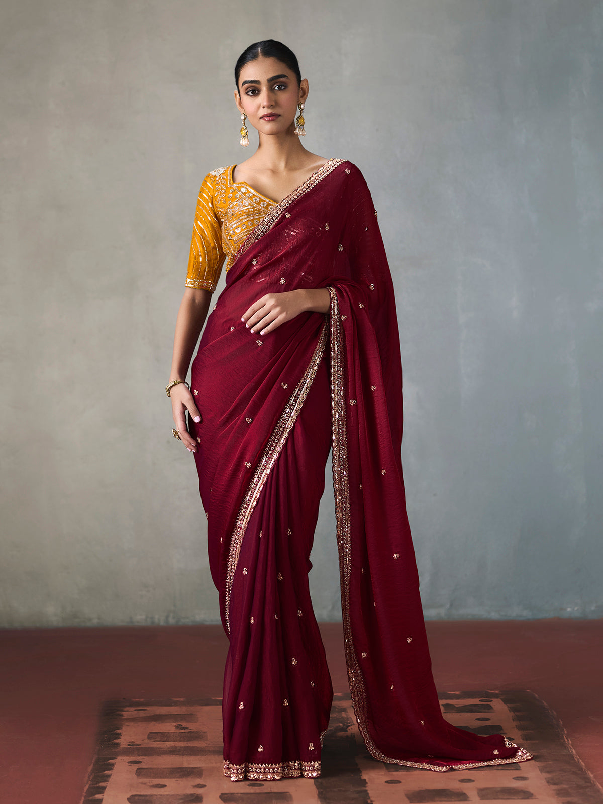 Maroon ornate finish silk blend women saree