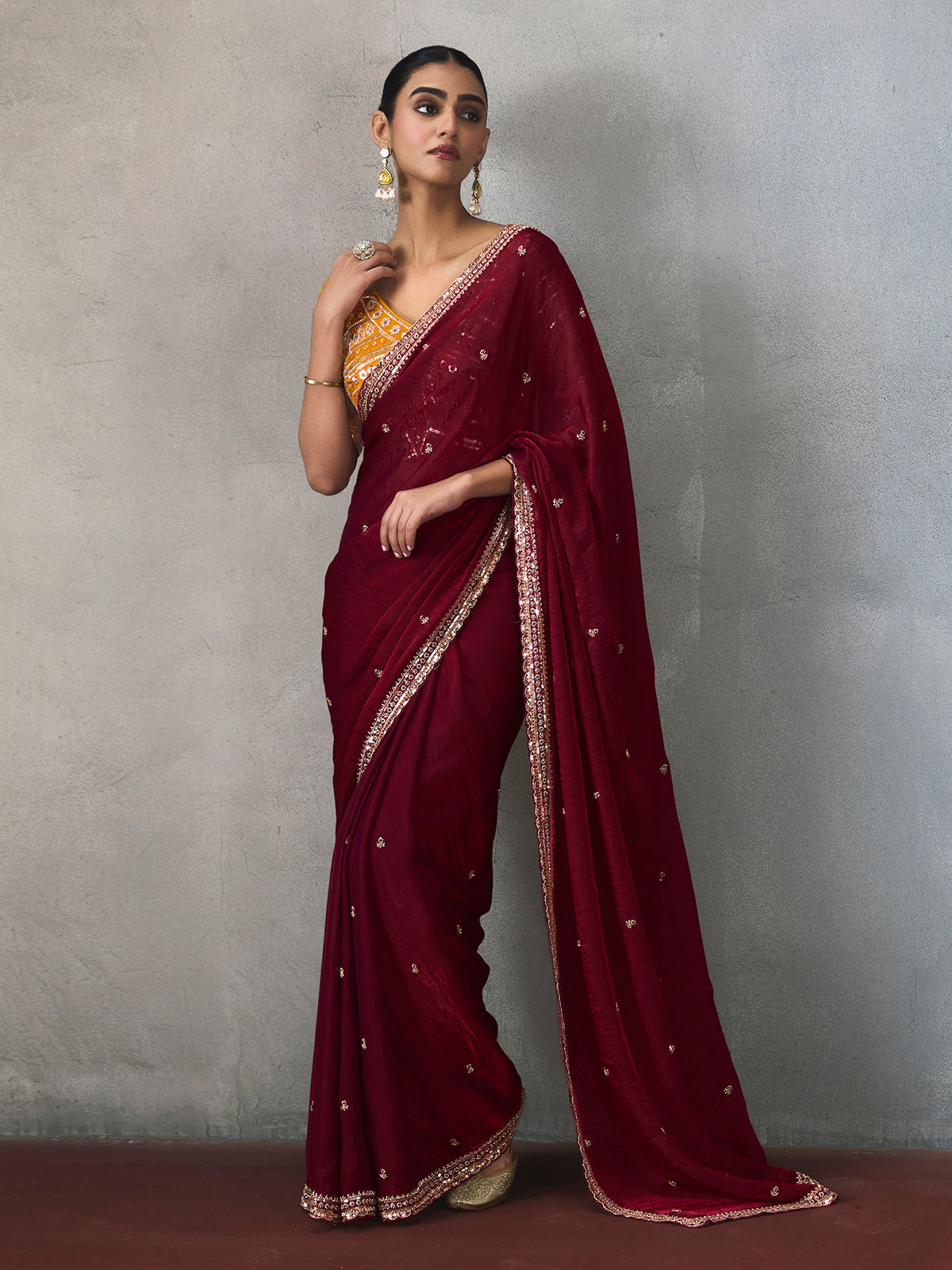 Maroon ornate finish silk blend women saree