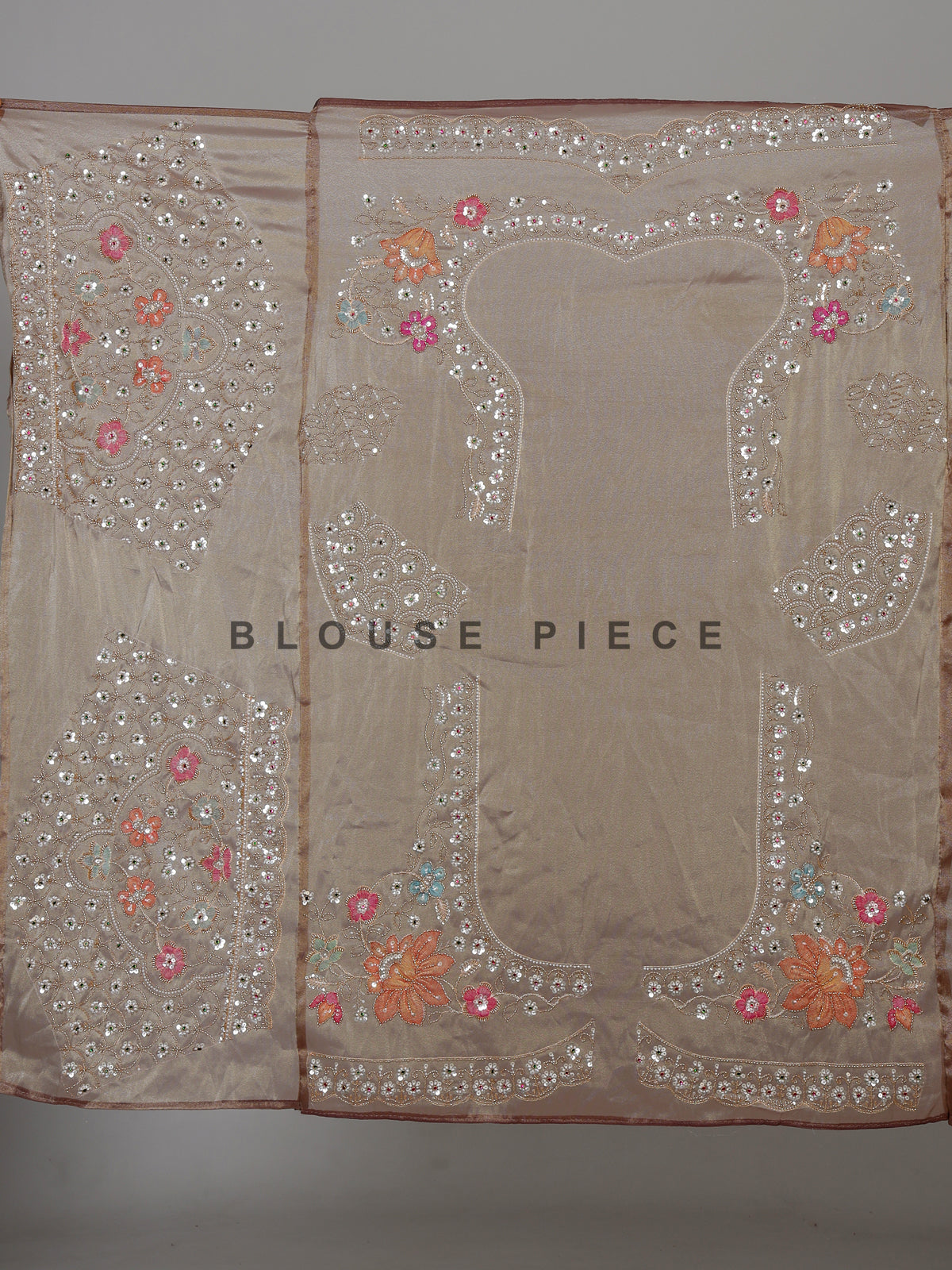 Coffee brown tissue silk saree with floral embroidery and tassels