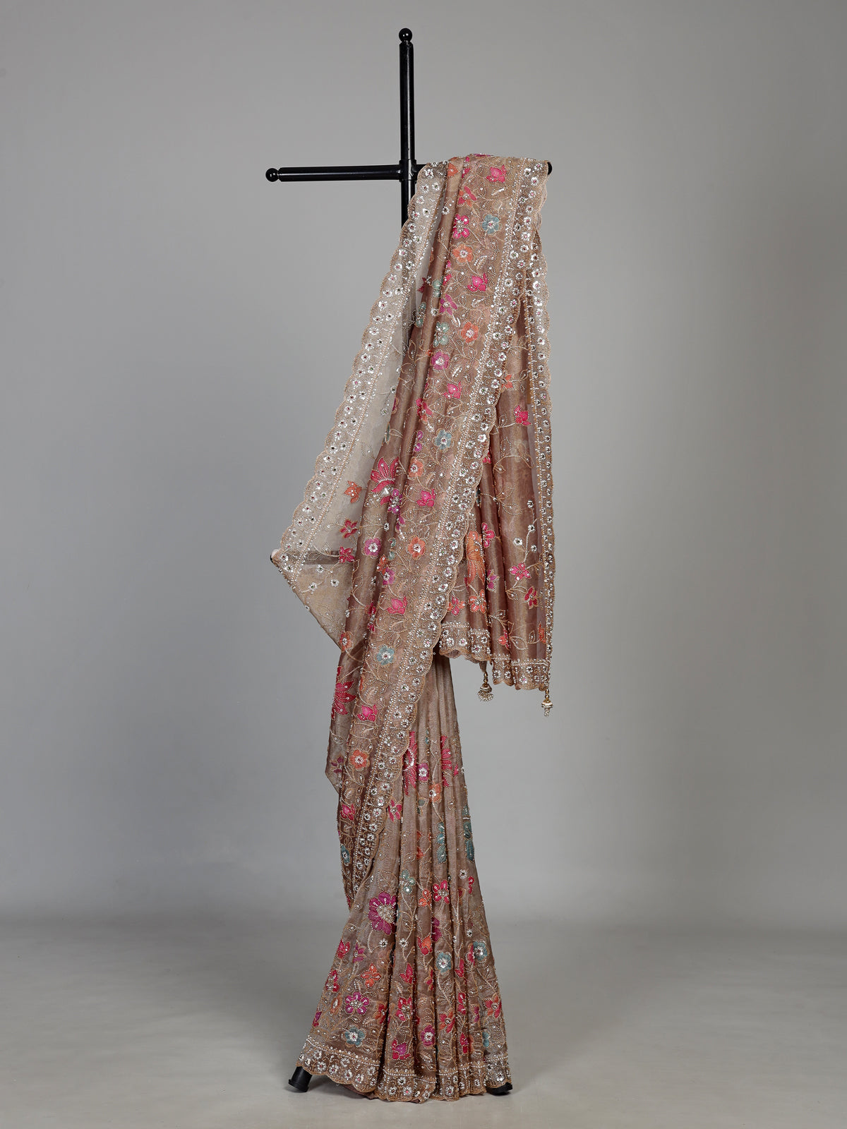 Coffee brown tissue silk saree with floral embroidery and tassels