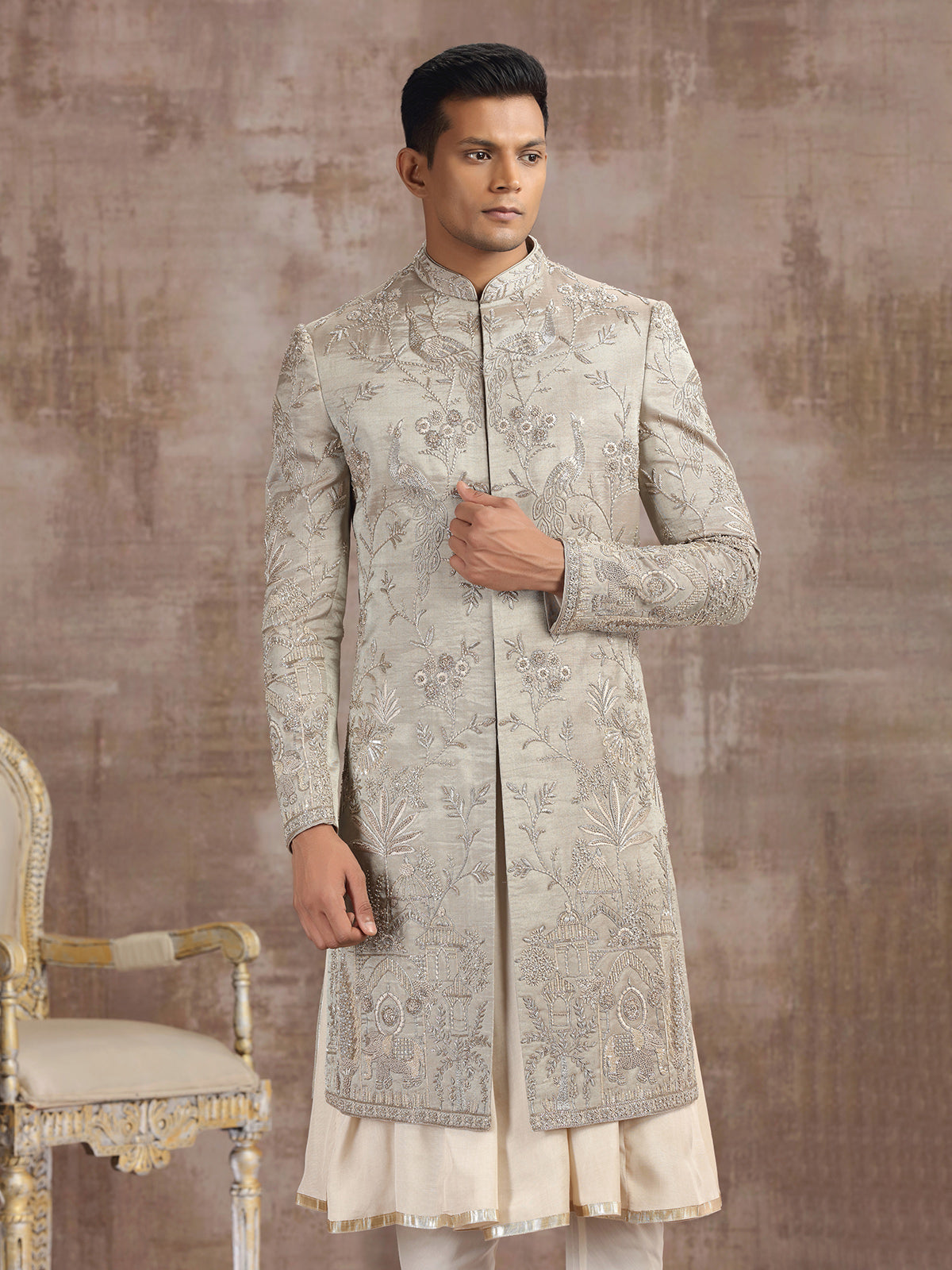 Antique gold tissue silk peshwai sherwani with royal detailing