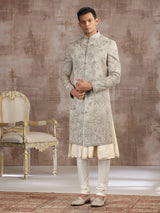 Antique gold tissue silk peshwai sherwani with royal detailing