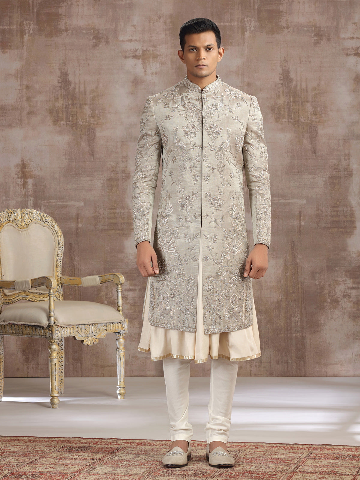 Antique gold tissue silk peshwai sherwani with royal detailing