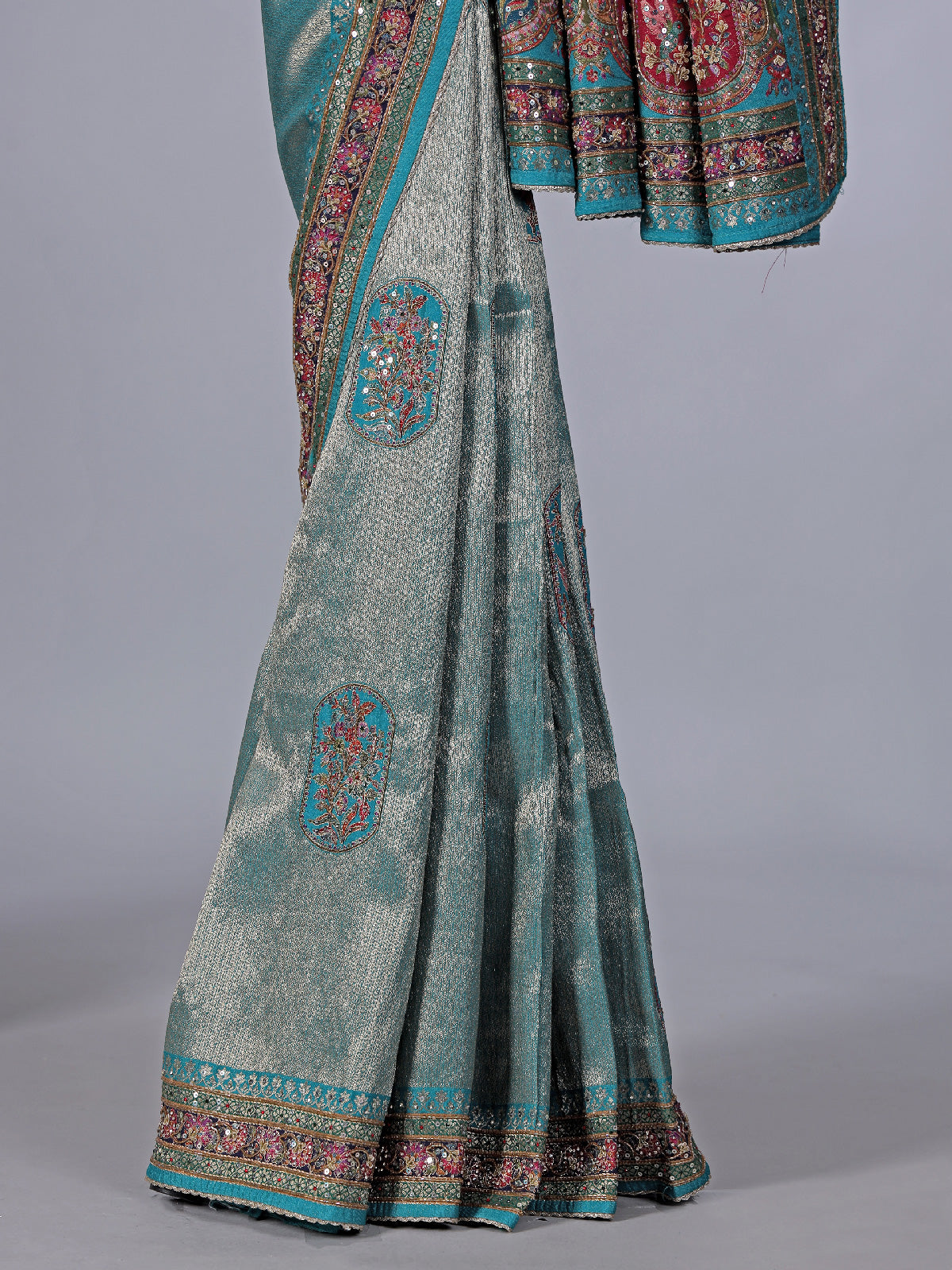Aqua modal tissue silk saree with festive motifs