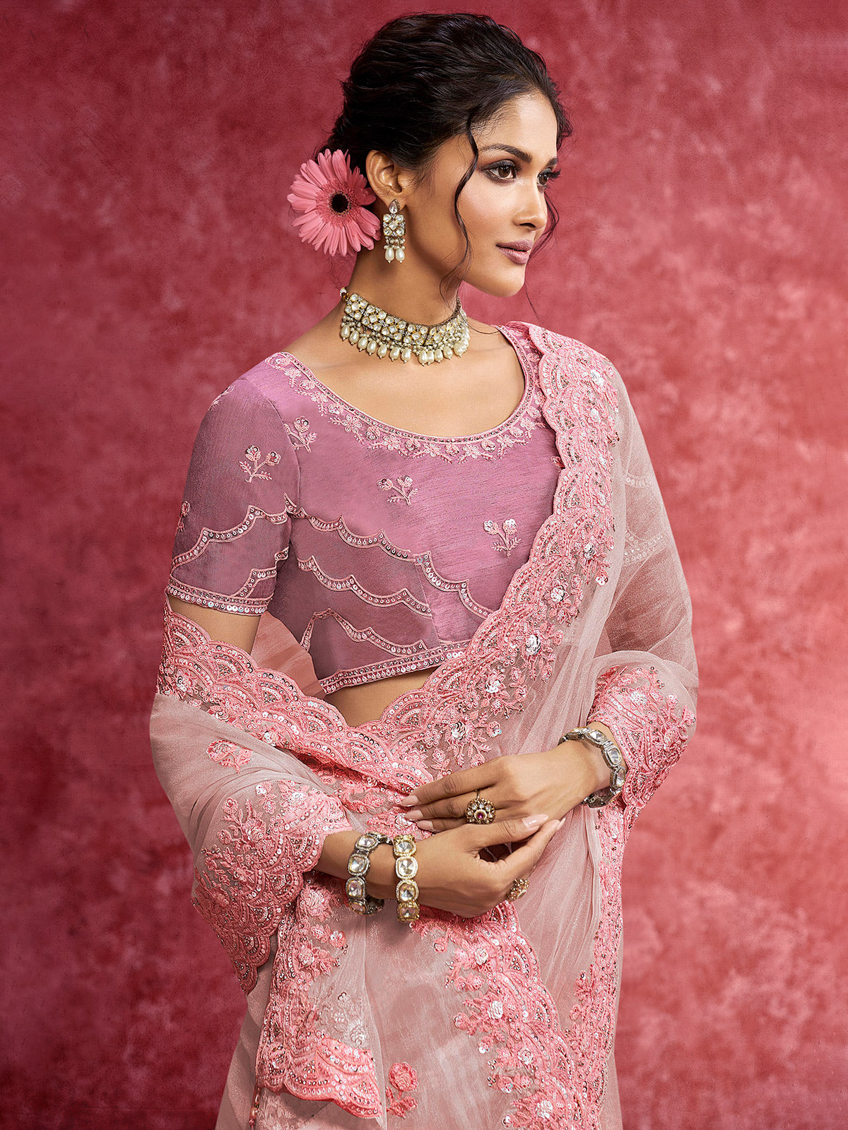 Baby pink tissue silk saree with rich border embellishment