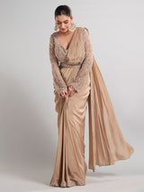Beige satin silk party wear saree with luxurious embellishments