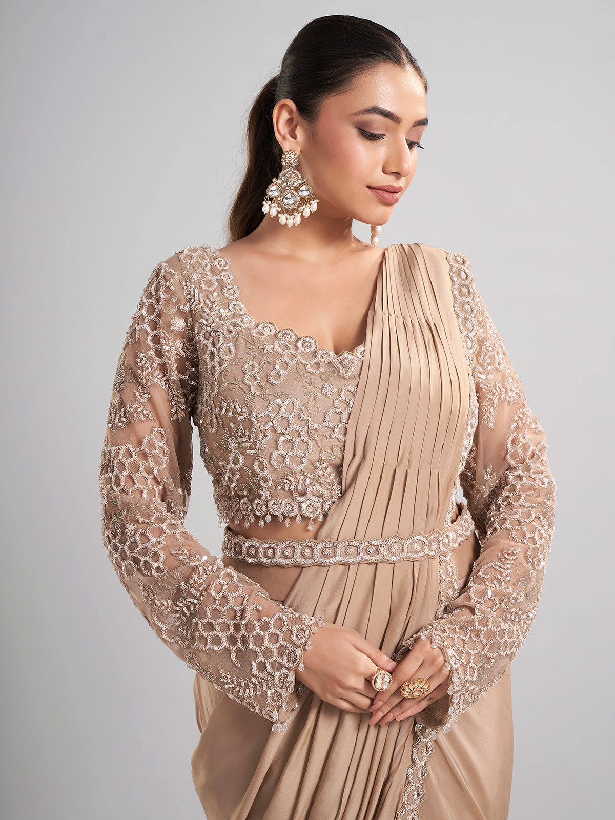 Beige satin silk party wear saree with luxurious embellishments