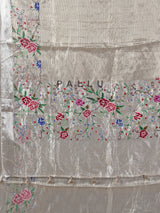 Beige tissue silk saree with thread and zari work