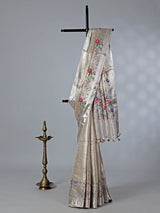 Beige tissue silk saree with thread and zari work