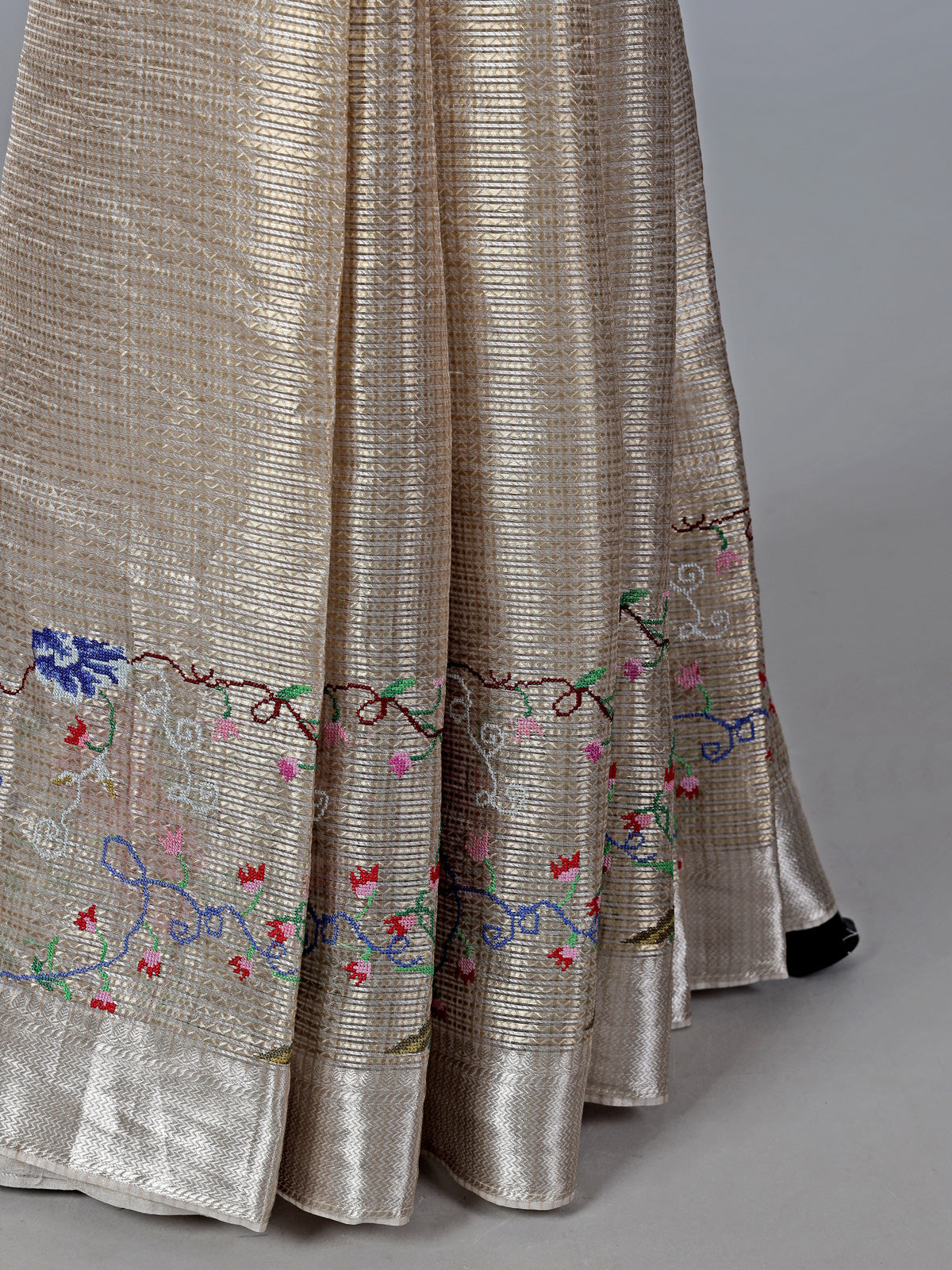 Beige tissue silk saree with thread and zari work