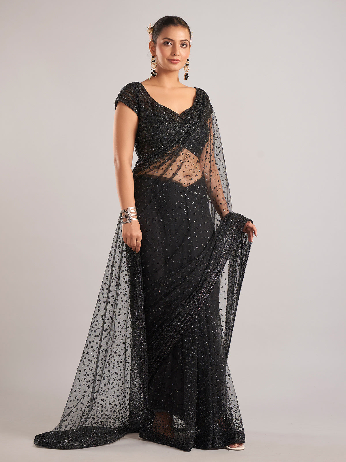Black net saree with Cutdana Embellishments