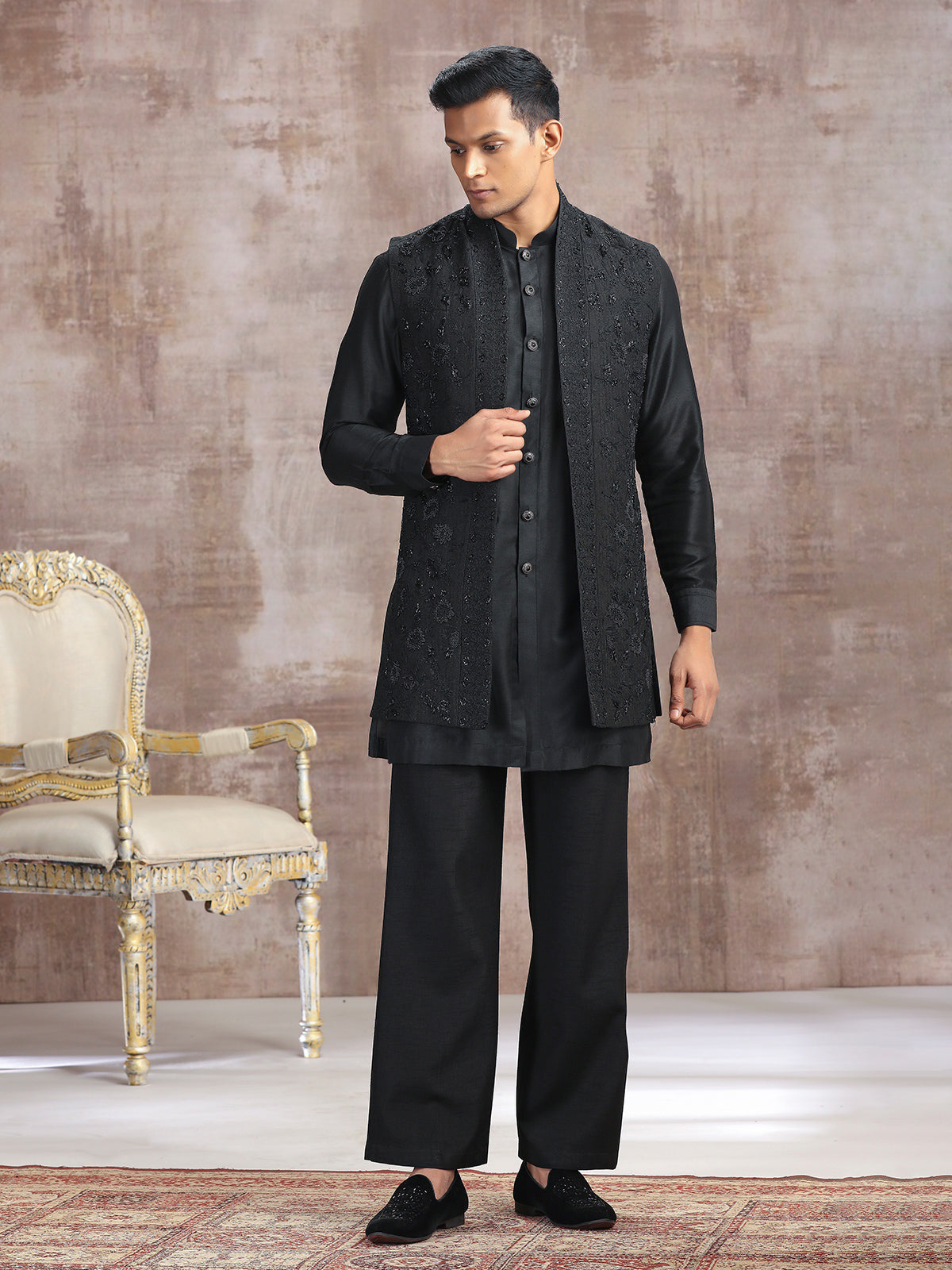 Black silk waistcoat set with thread work
