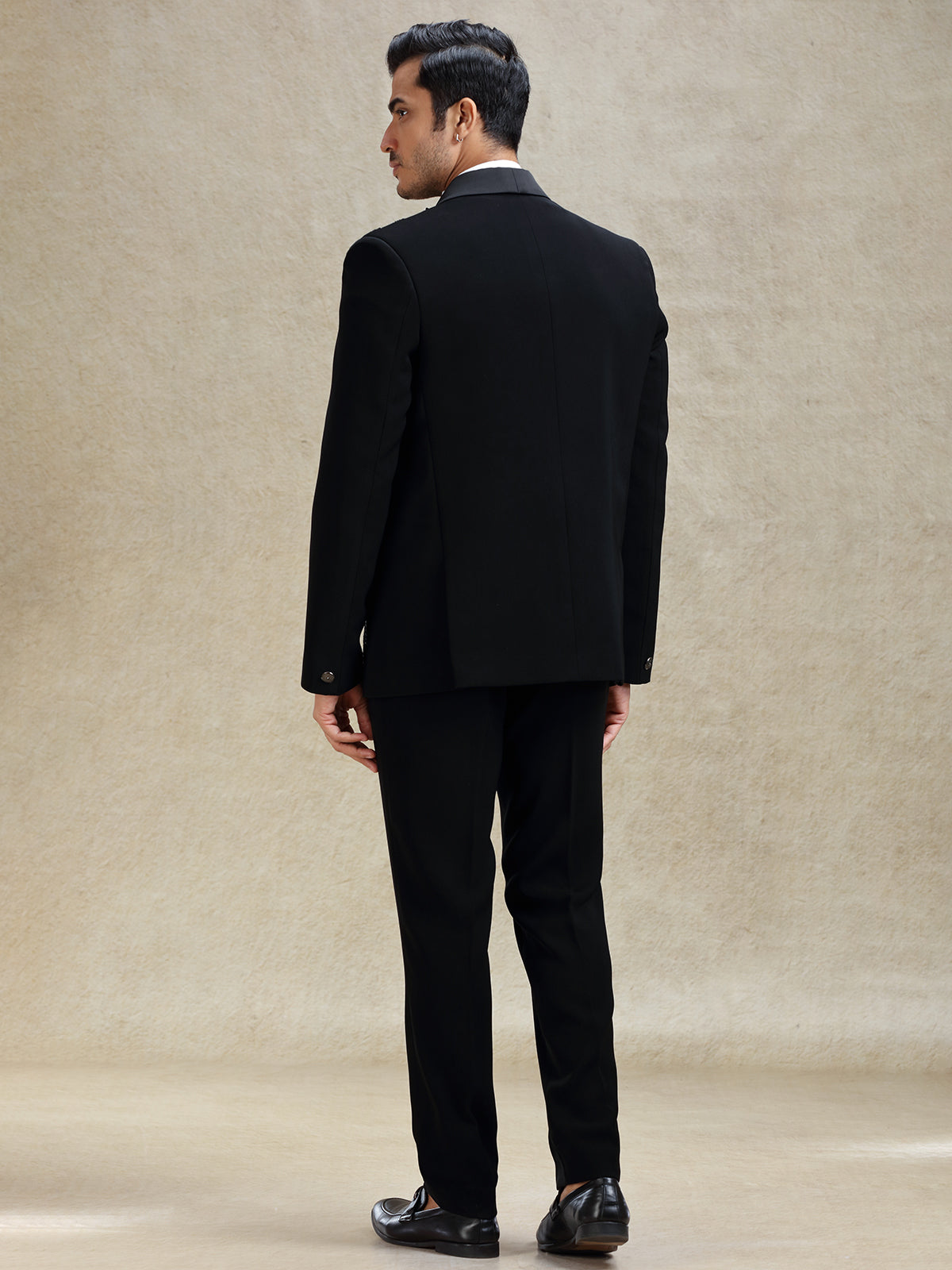 Black terry rayon tuxedo suit in crystal work