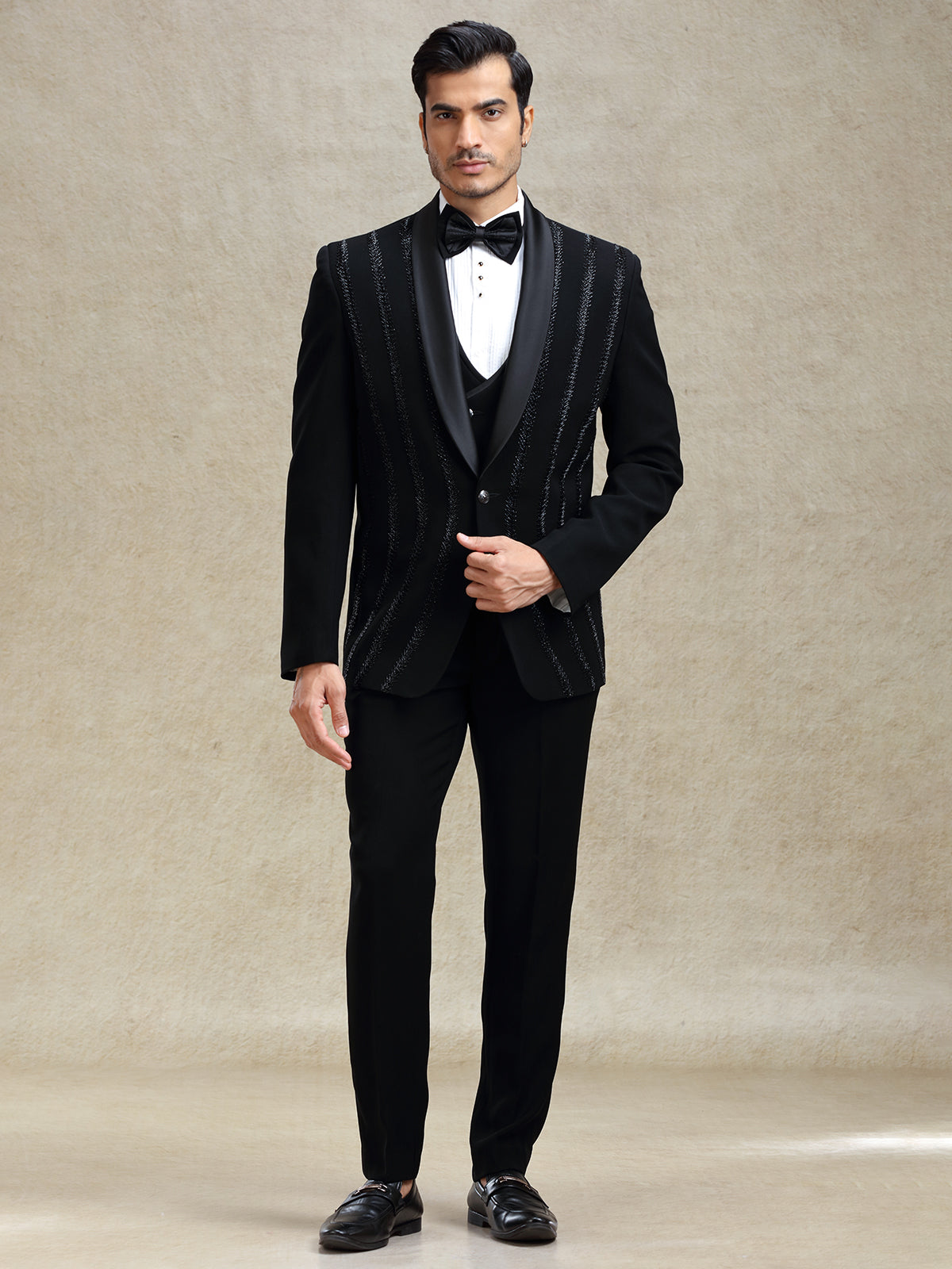 Black terry rayon tuxedo suit in crystal work