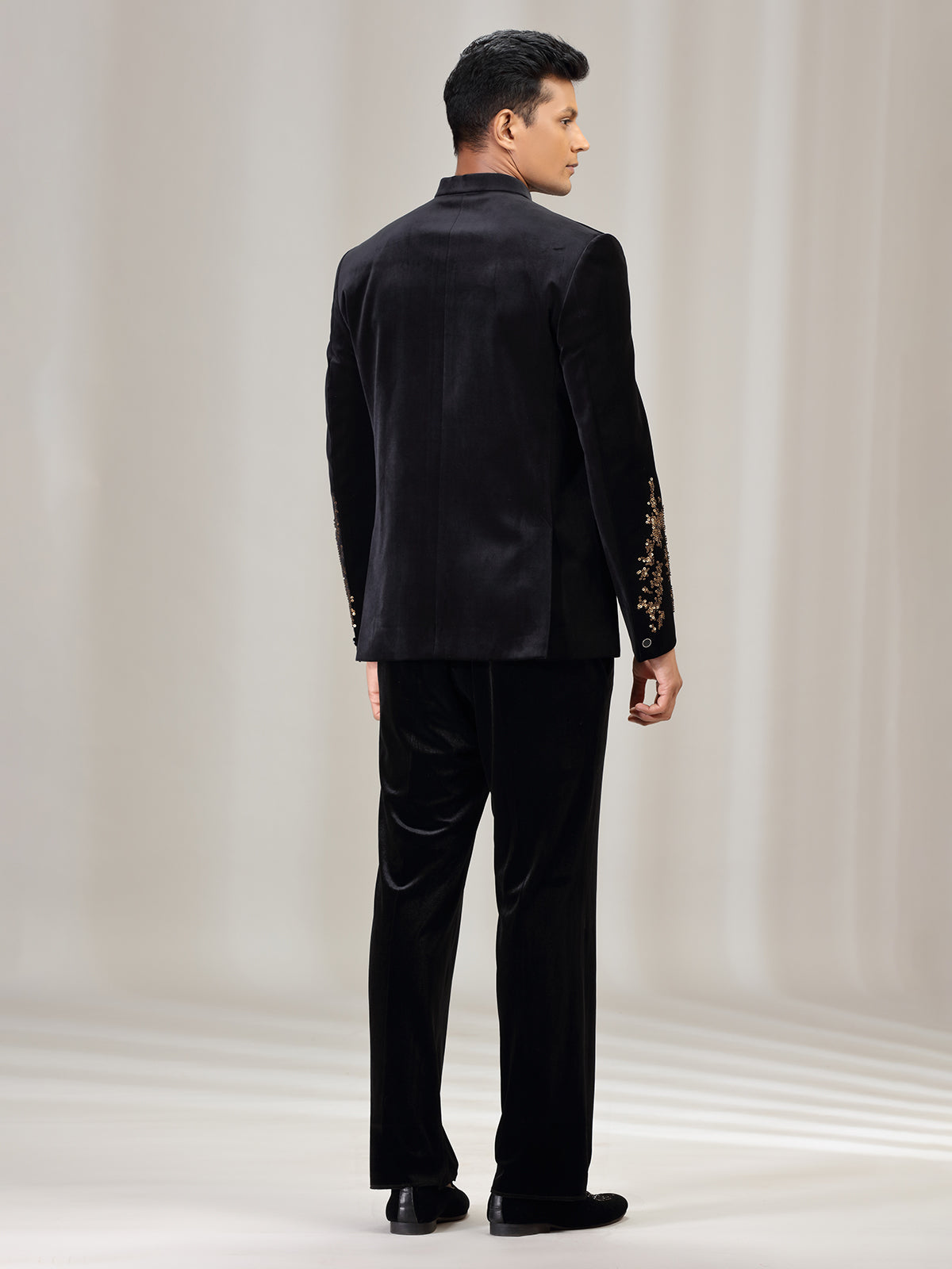Black velvet jodhpuri suit with beads work