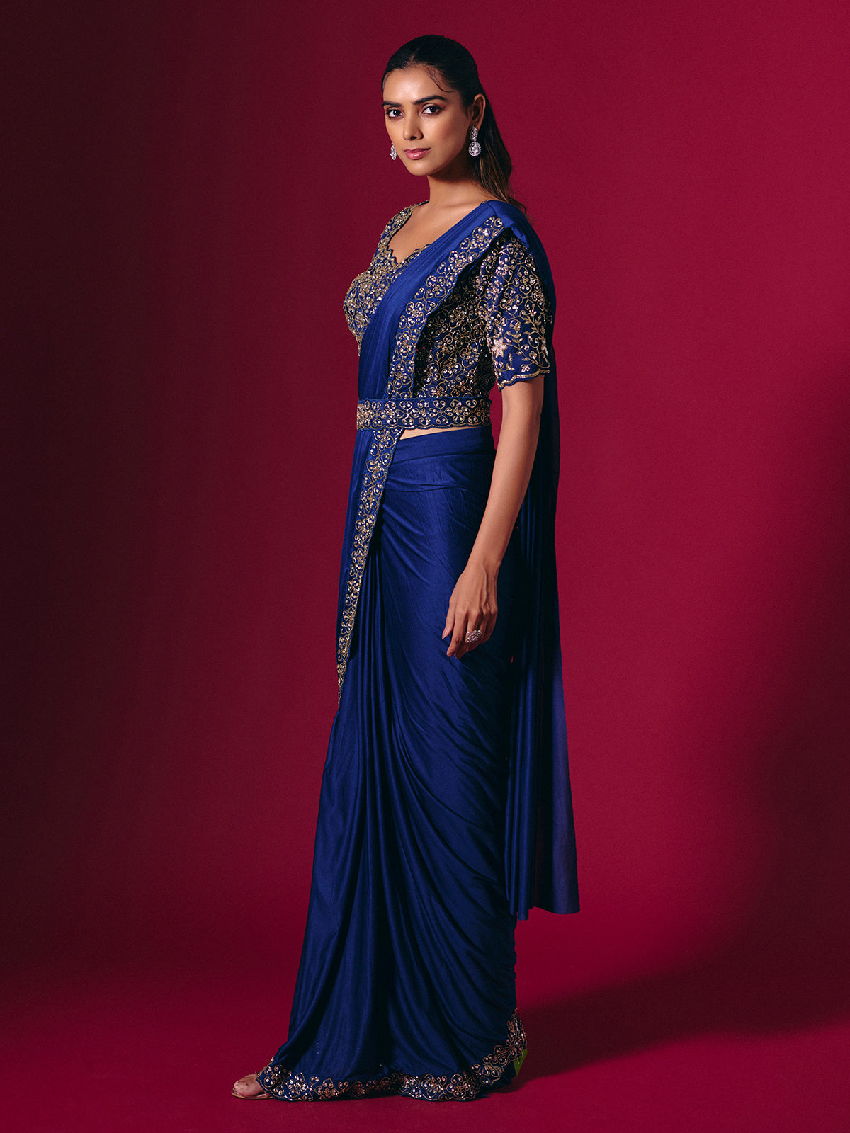 Blue lycra saree enhanced with sequins and cutdana work