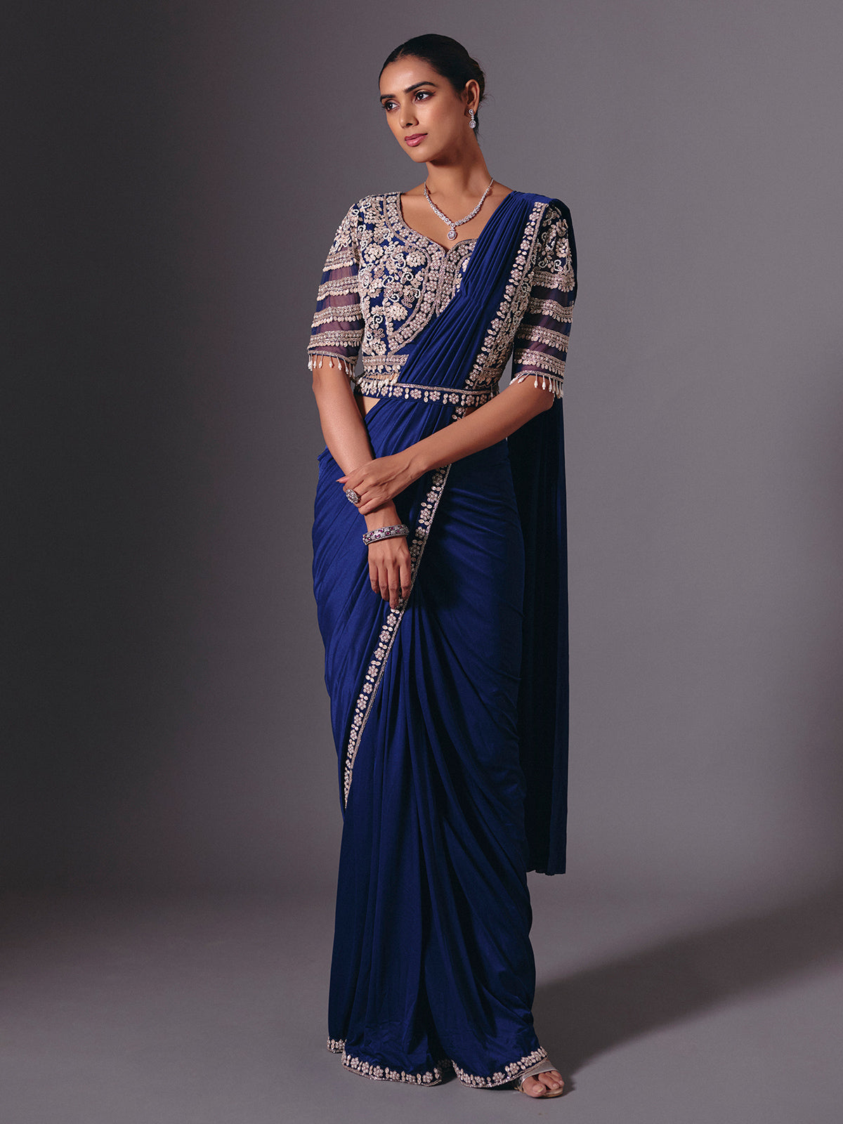 Blue lycra saree with multi work festive embellishments