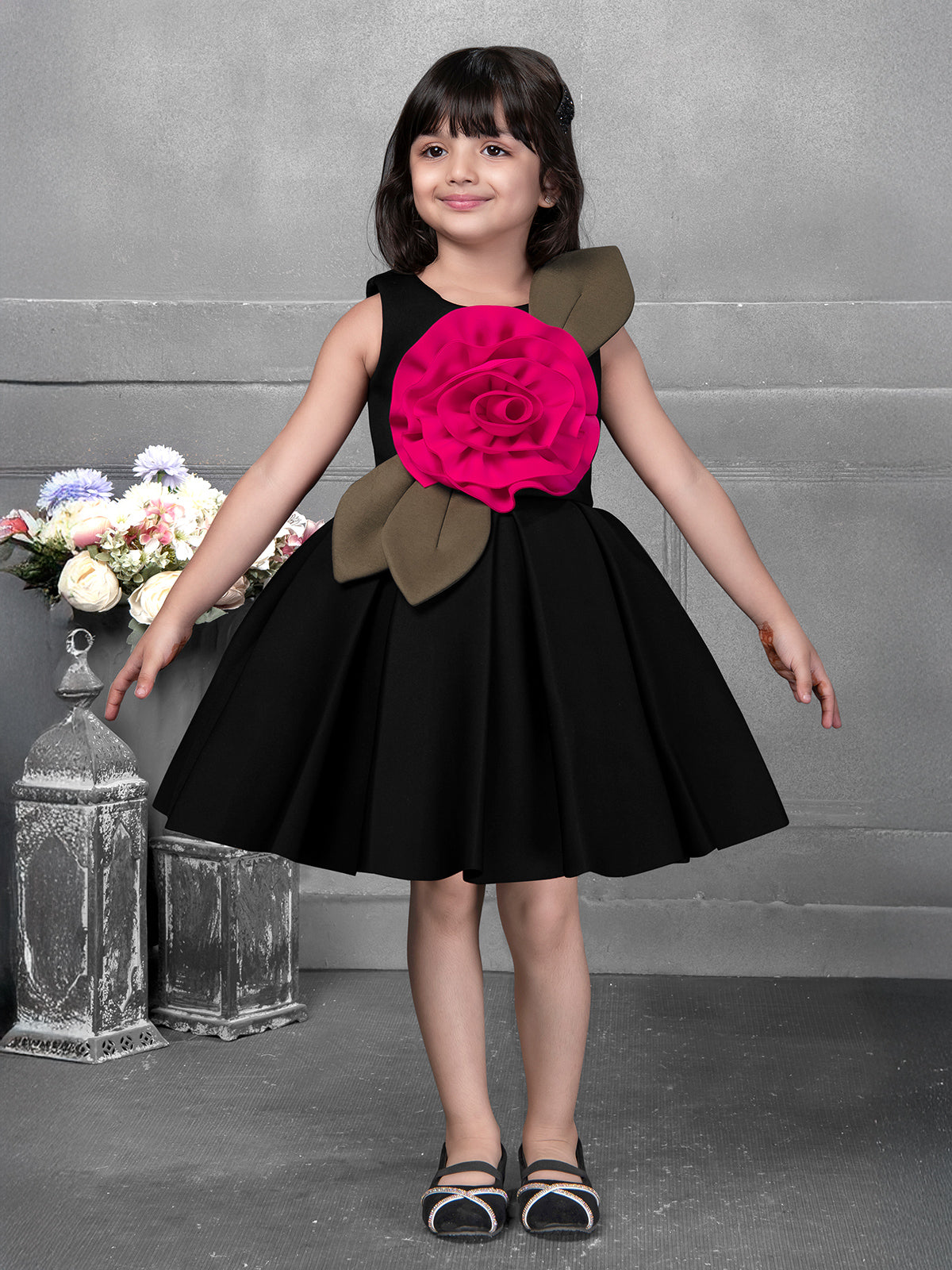 Chic black satin frock with sleeveless round neck