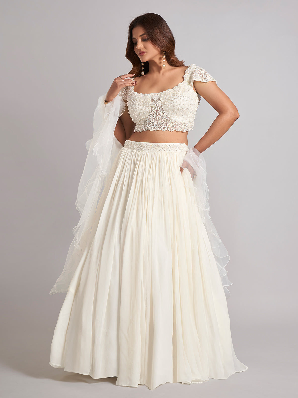Cream georgette lehenga choli with pearl work