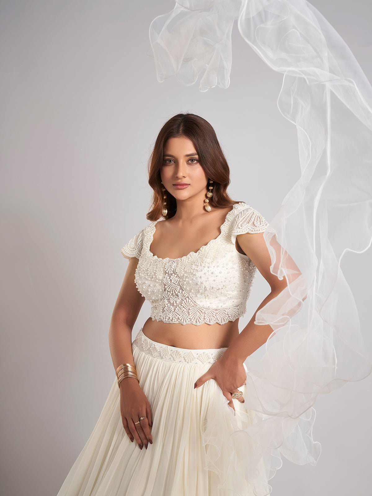 Cream georgette lehenga choli with pearl work