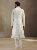 Cream silk peshwai groom sherwani with dupatta