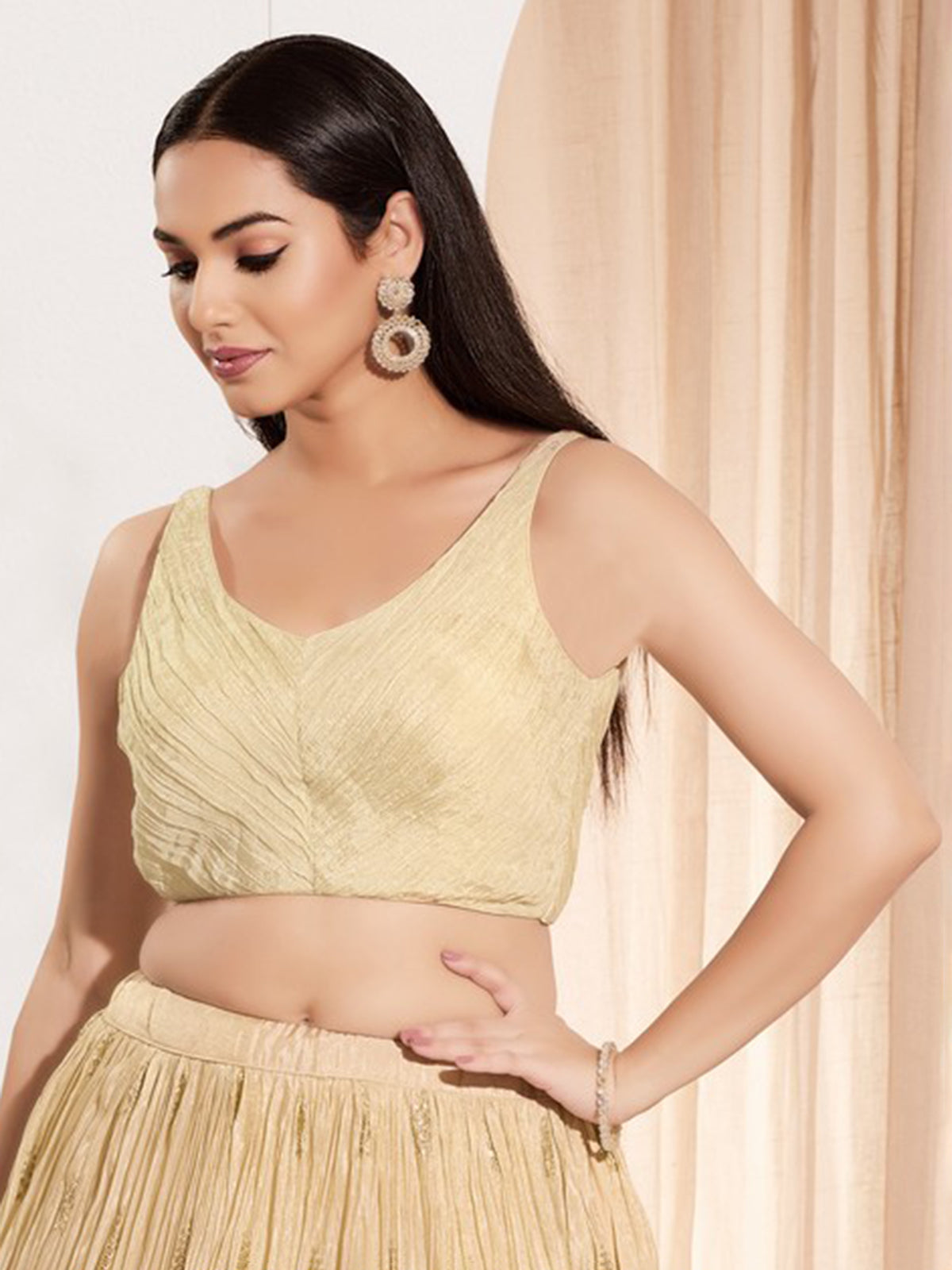 Cream tissue silk sleeveless sweetheart neck blouse