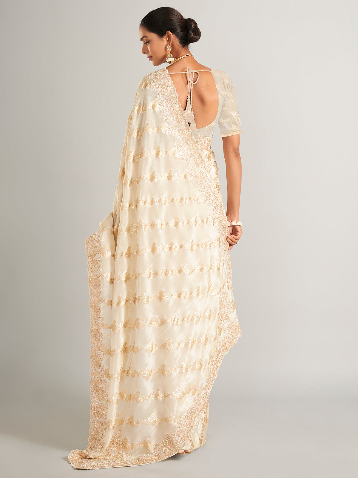 Fascinating silk saree in cream colour