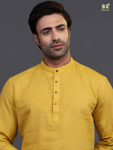 Gold linen half buttoned placket kurta suit