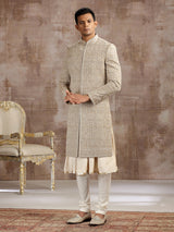 Gold silk peshwai sherwani with subtle shine