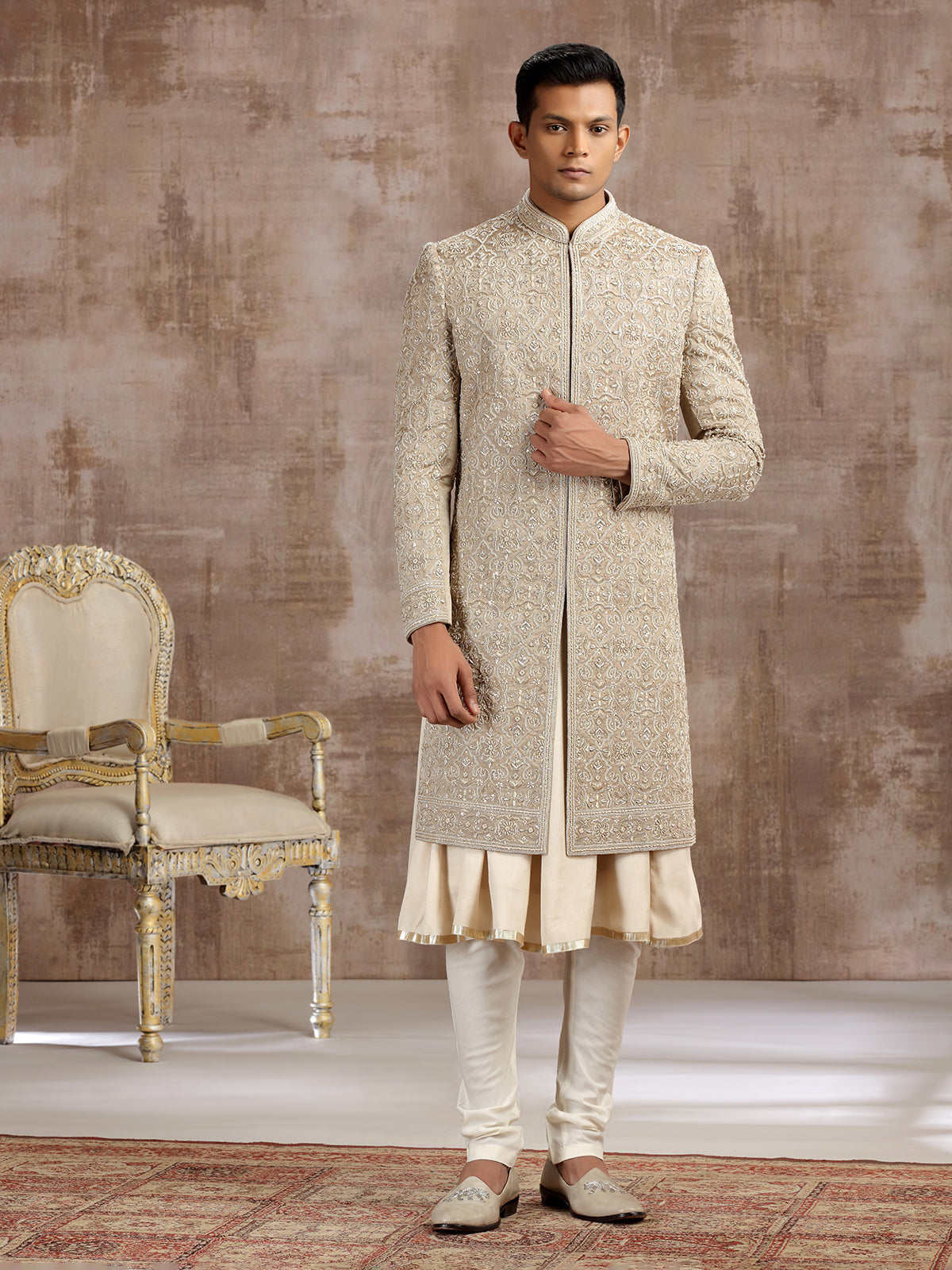 Gold silk peshwai sherwani with subtle shine