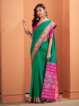 Green patola silk saree with festive radiance