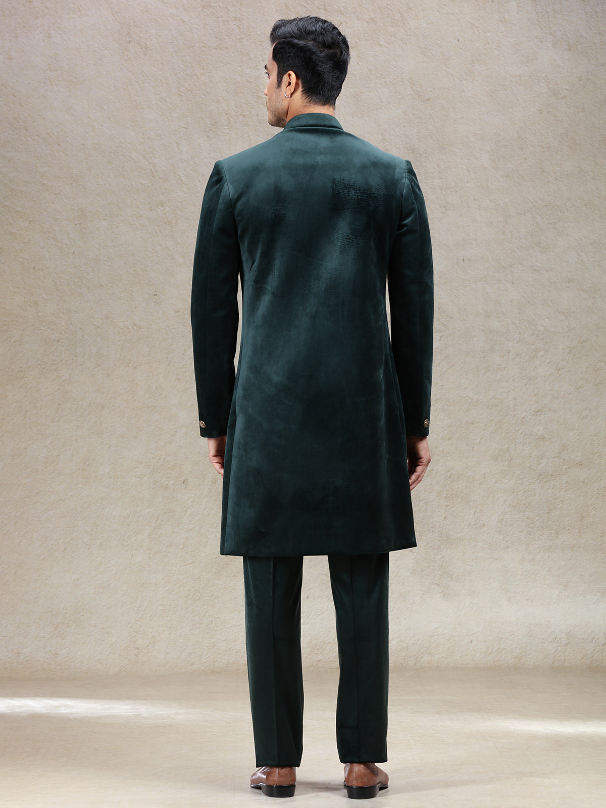 Green royal charming velvet sherwani with elephant patch