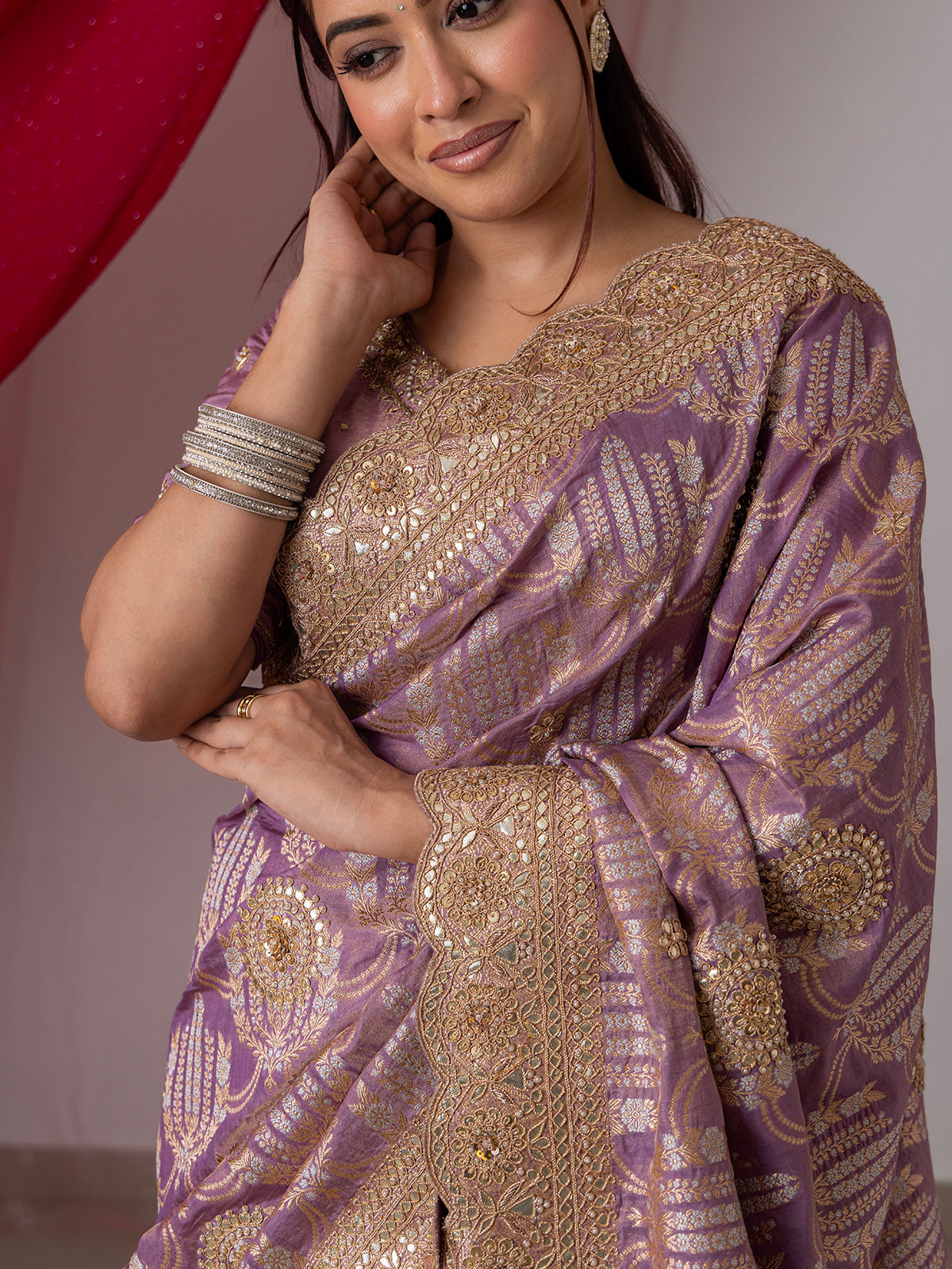 Light purple silk saree embellished with beads and resham