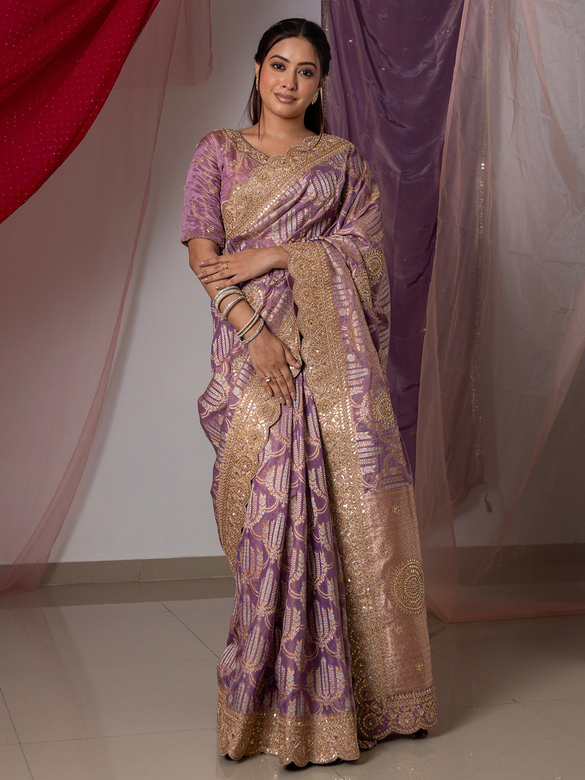 Light purple silk saree embellished with beads and resham