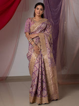 Light purple silk saree embellished with beads and resham
