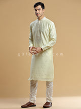 Light yellow silk festive wear kurta suit